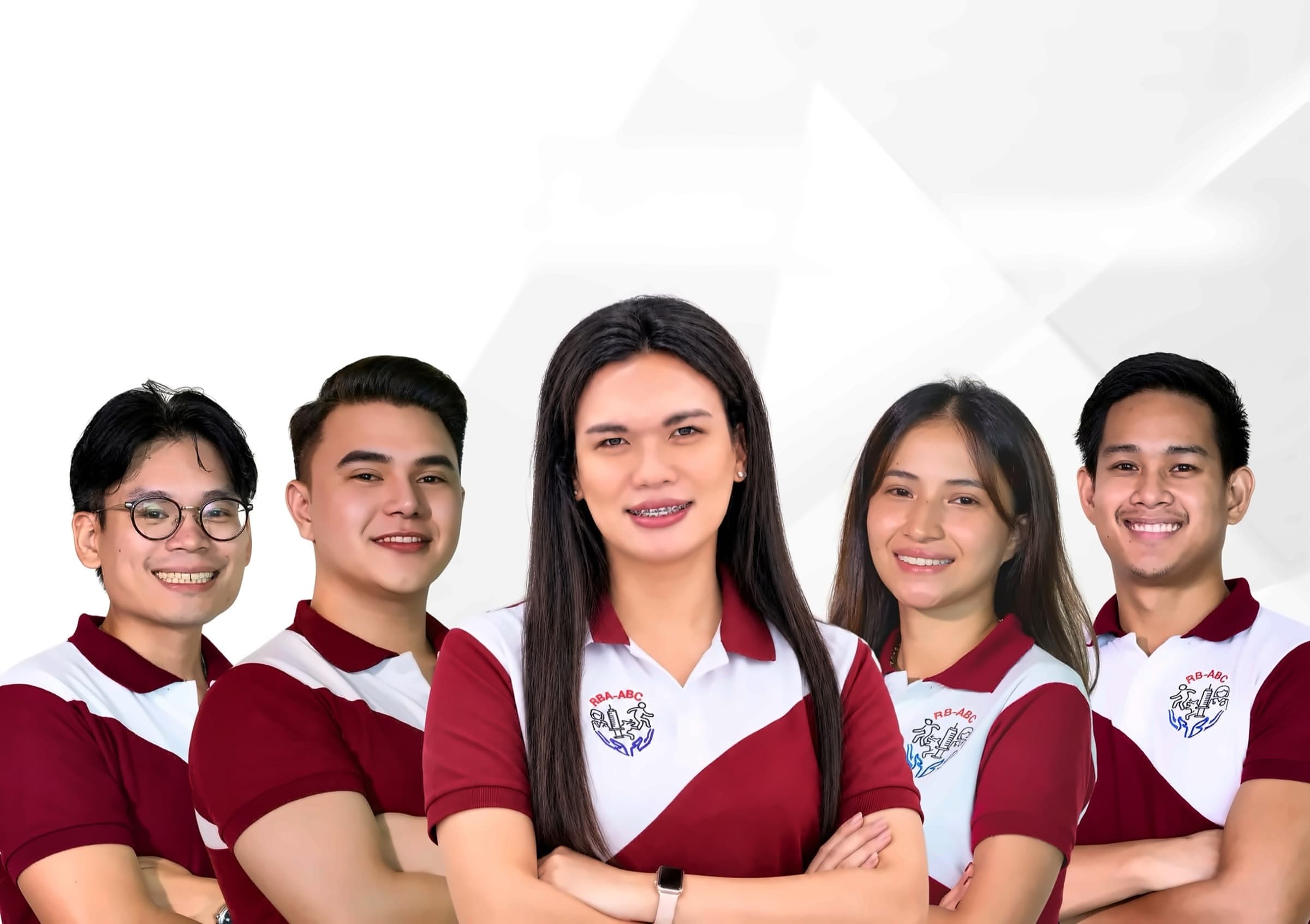 Five smiling RB-ABC team members in red and white RB-ABC uniforms, standing with arms crossed
